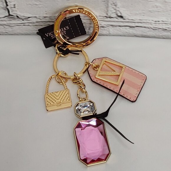 VICTORIA'S SECRET 'BOMBSHELL' SIGNATURE CHARMS PARFUM KEYCHAIN - Picture 16 of 16